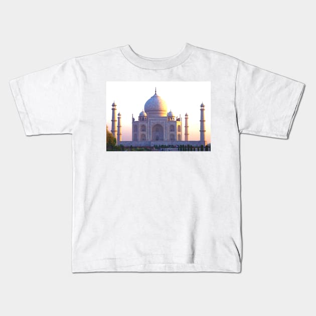 The Taj Mahal at sunrise Kids T-Shirt by JohnDalkin